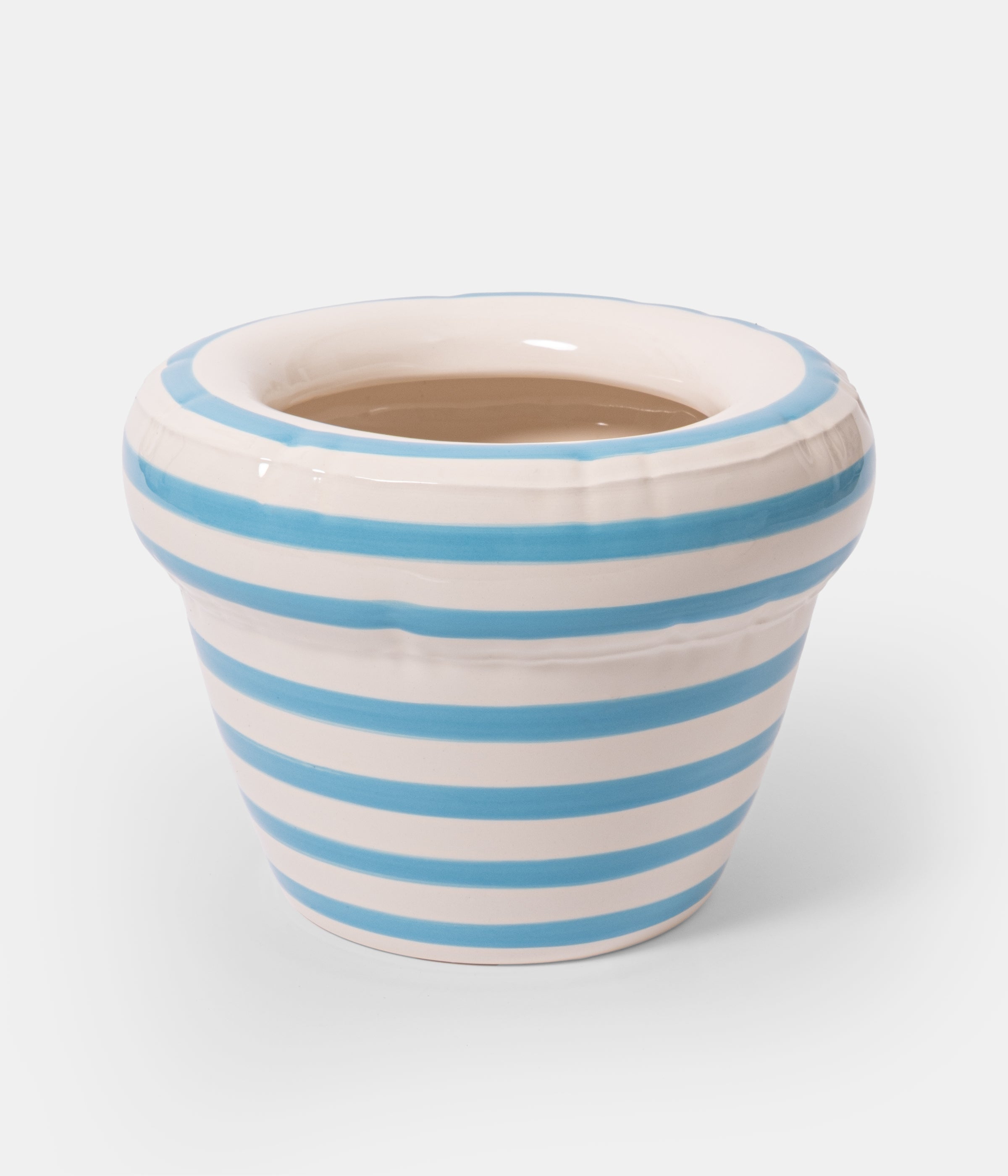 Ceramic Home Studyo planter with blue and white stripes on a white background